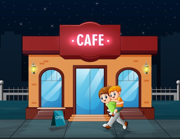 A brother holding his younger brother in front of the cafe