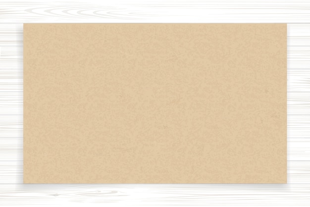 Brown paper sheet on white wood.