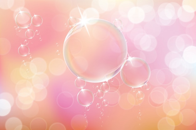 Bubbles soap on pink background.