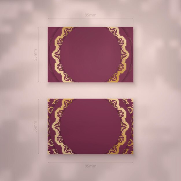 Burgundy business card template with greek gold pattern for your personality.