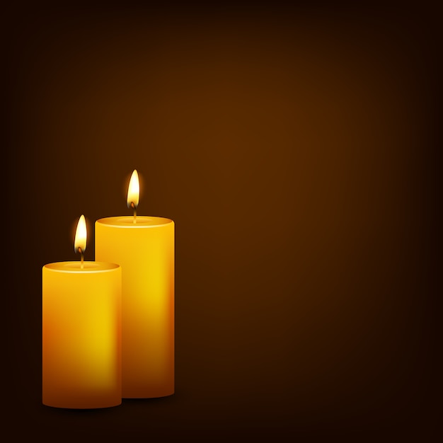 burning candles on a dark background