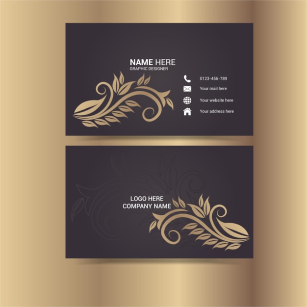 A business card for a feather company with gold feathers on a gold background.