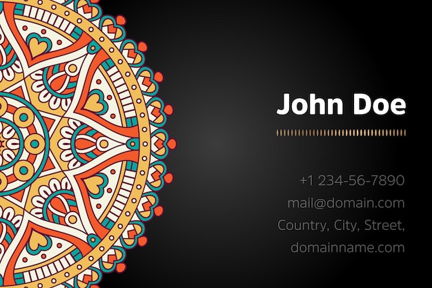 Business card with gold mandala design