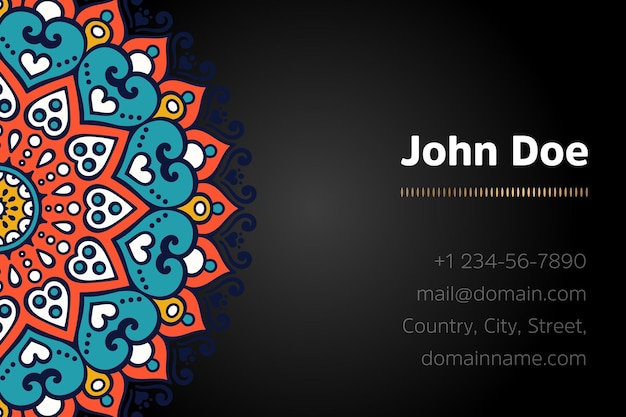 Business card with gold mandala design