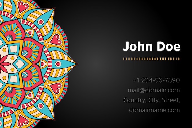 Business card with gold mandala design