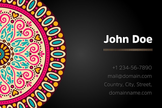 Business card with gold mandala design