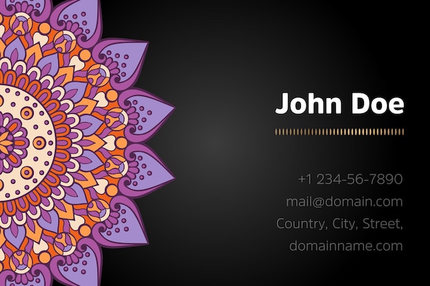 Business card with gold mandala design