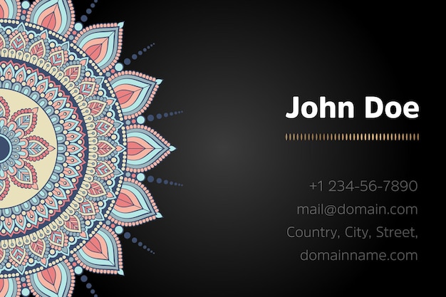 Business card with gold mandala design