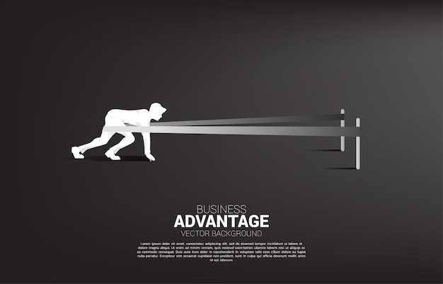 Business concept of and business advantage. Silhouette of businessman ready to run with catapult sling shot