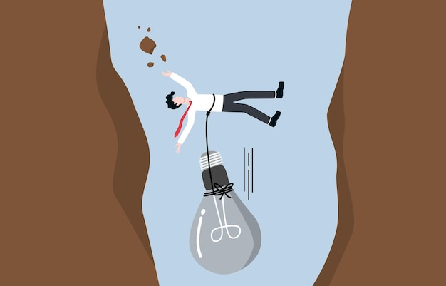 Business failure due to wrong idea concept Businessman falling down into valley with old light bulb