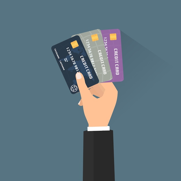 Business man hand with multiple credit cards for paying out