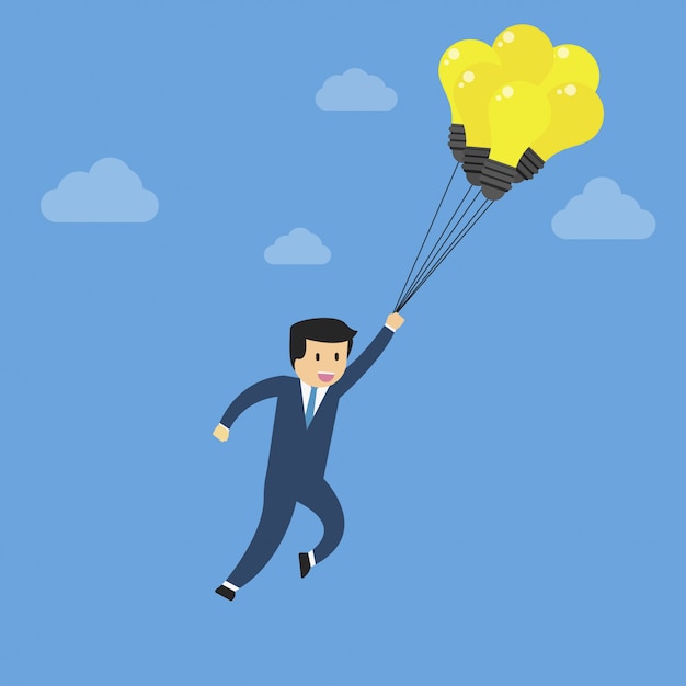 Businessman flying with balloon to the sky