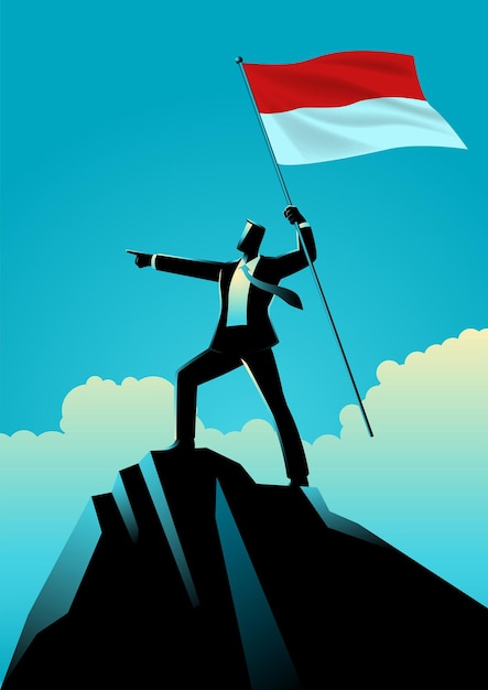 businessman holding the flag of Indonesia on top of the mountain