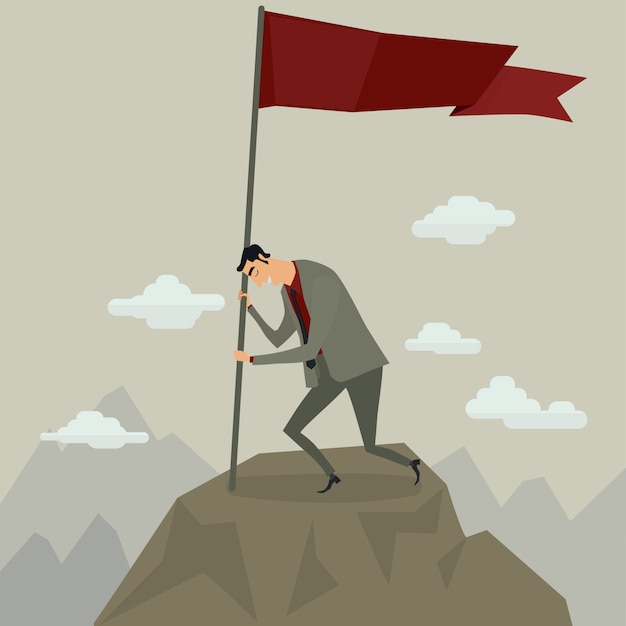 Businessman holding flag on top of mountain