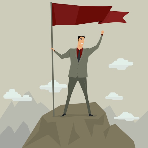 Businessman holding flag on top of mountain