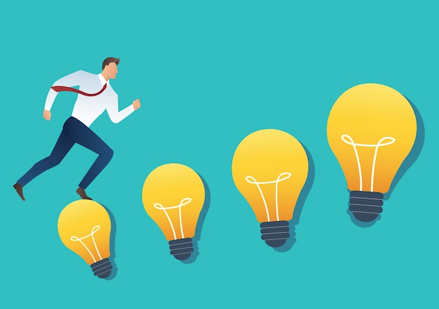 businessman running on light bulb idea concept