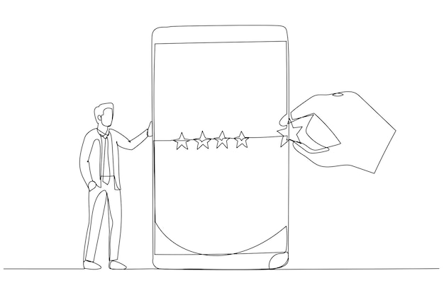 Businessman standing with mobile phone with giant hand rating five stars