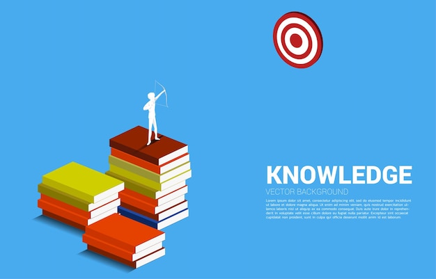 Businessman in suit shoot the arrow on book stack Business Concept of marketing target and customer