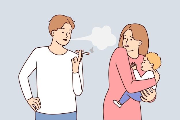 Careless man smoking cigarettes standing next to woman with infant in arms