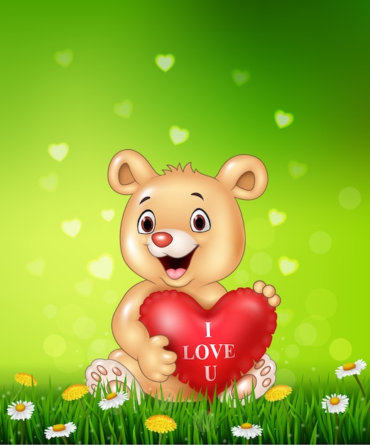 Cartoon bear holding red heart balloons on green grass