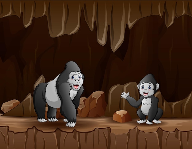 Vector cartoon a gorilla with her cub in the cave