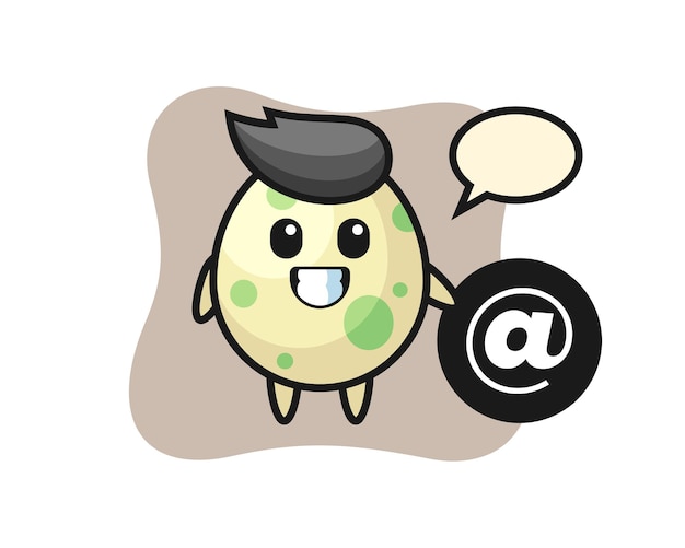 Cartoon illustration of spotted egg standing beside the At symbol