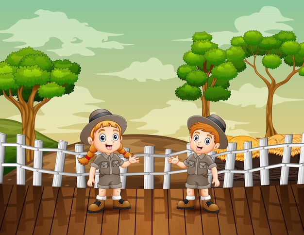 Cartoon illustration of zookeeper boy and girl in the open zoo