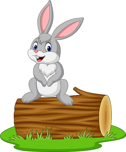 Cartoon rabbit sitting on a log