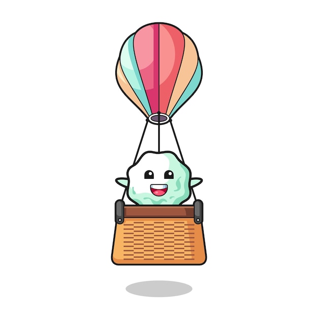 Chewing gum mascot riding a hot air balloon