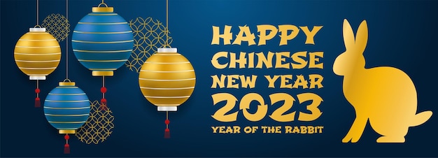 Chinese new year 2023 of the rabbit with realistic rose gold and blue baubles China gold gradient text Golden hare on a blue background Vector illustration