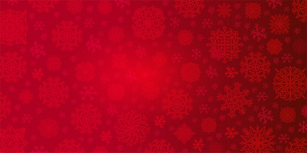 Christmas background of big and small snowflakes in red colors