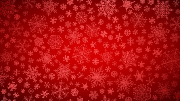 Christmas background of big and small snowflakes white on red