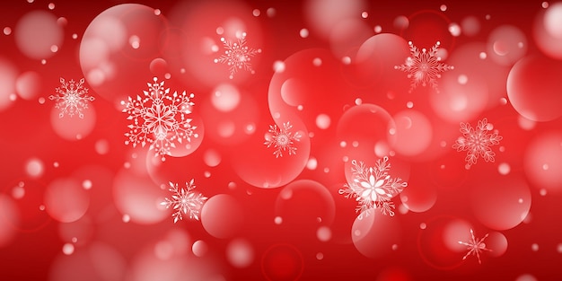 Christmas background of complex big and small falling snowflakes in red colors with bokeh effect