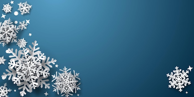 Christmas background of paper snowflakes with soft shadows, white on blue background