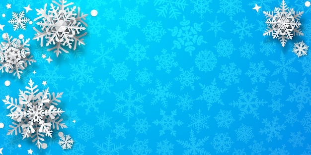 Christmas background of paper snowflakes with soft shadows white on light blue background with falling snow