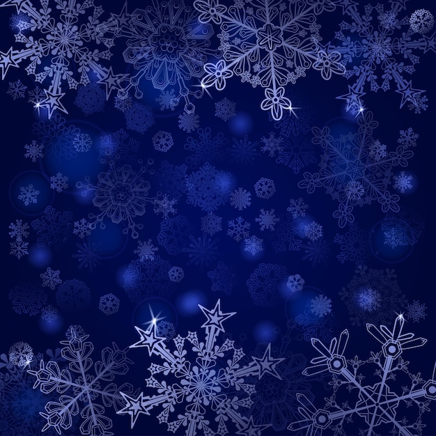 Christmas background of snowflakes in blue colors