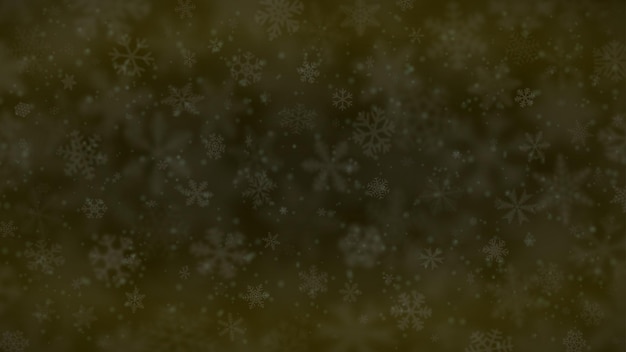 Christmas background of snowflakes of different shapes sizes blur and transparency in dark yellow colors