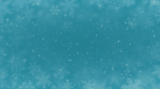 Christmas background of snowflakes of different shapes sizes blur and transparency in light blue colors