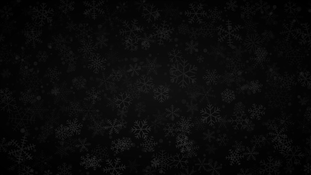 Christmas background of snowflakes of different shapes sizes and transparency in black and gray colors