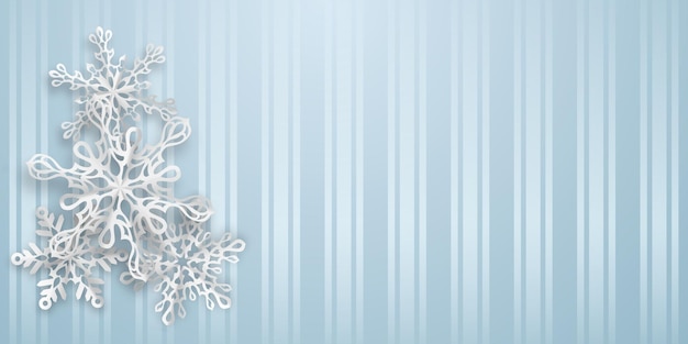 Christmas background with several paper snowflakes with soft shadows on light blue striped background