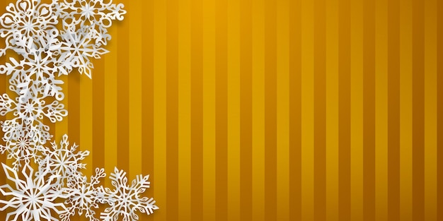 Christmas background with several paper snowflakes with soft shadows on yellow striped background