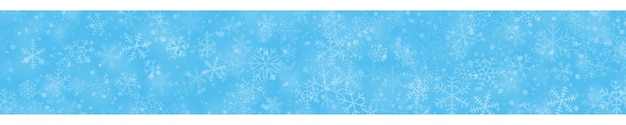 Christmas banner of snowflakes of different shapes sizes and transparency on light blue background