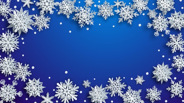 Christmas illustration of white complex paper snowflakes with soft shadows on blue background