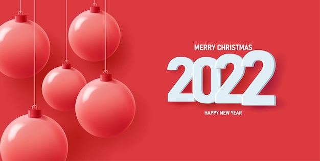 Christmas and new year poster with 3d red mono chrome balls on red backdrop big white 2022 number