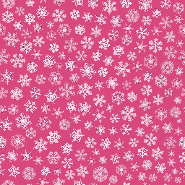 Christmas seamless pattern of small snowflakes white on pink