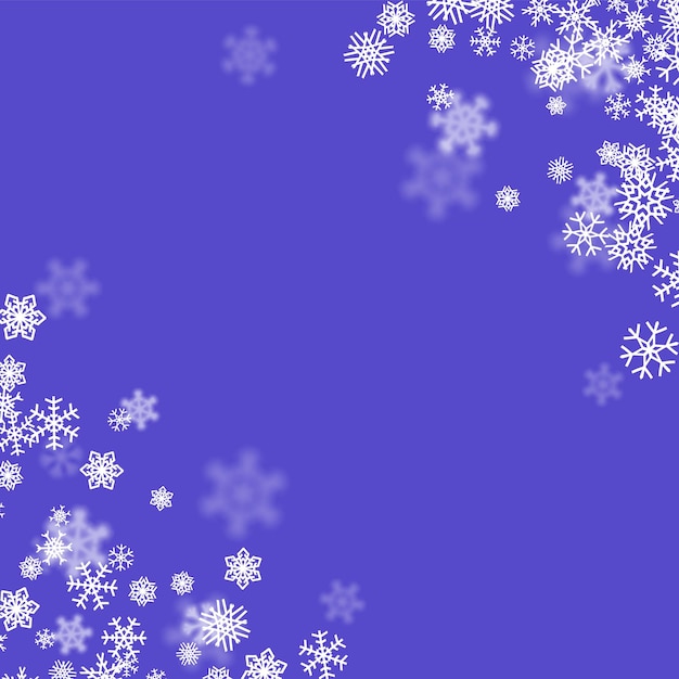 Christmas snow background with scattered snowflakes falling in winter