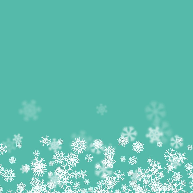 Christmas snow background with scattered snowflakes falling in winter