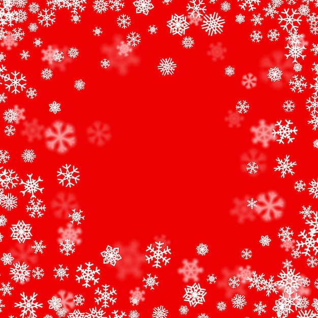 Christmas snow background with scattered snowflakes falling in winter