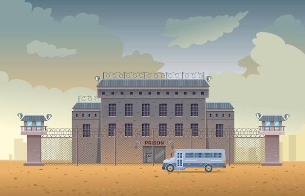 City prison building with two watchtowers with barbed wire fence