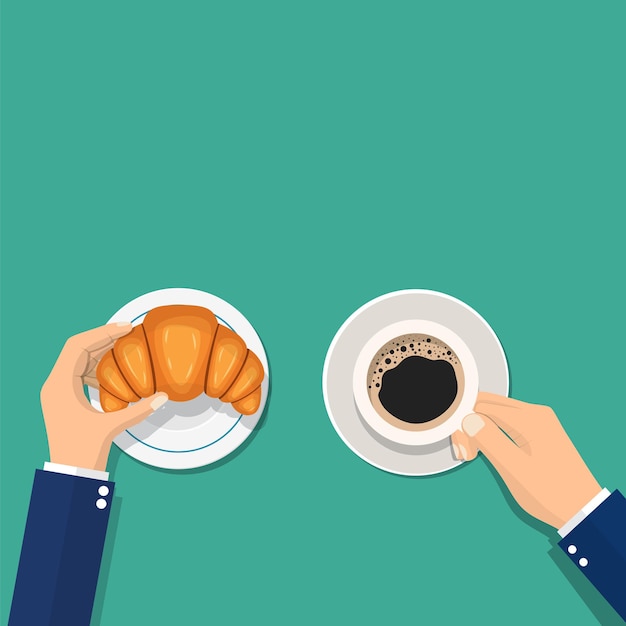 Coffee and croissants, hands man. Hands holding croissants. Breakfast